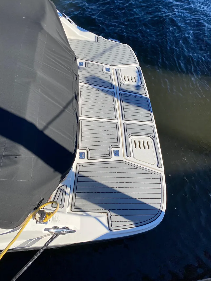 Slide: The Image of 2020 Sea Ray SLX 350 swim platform on calm water. - 5