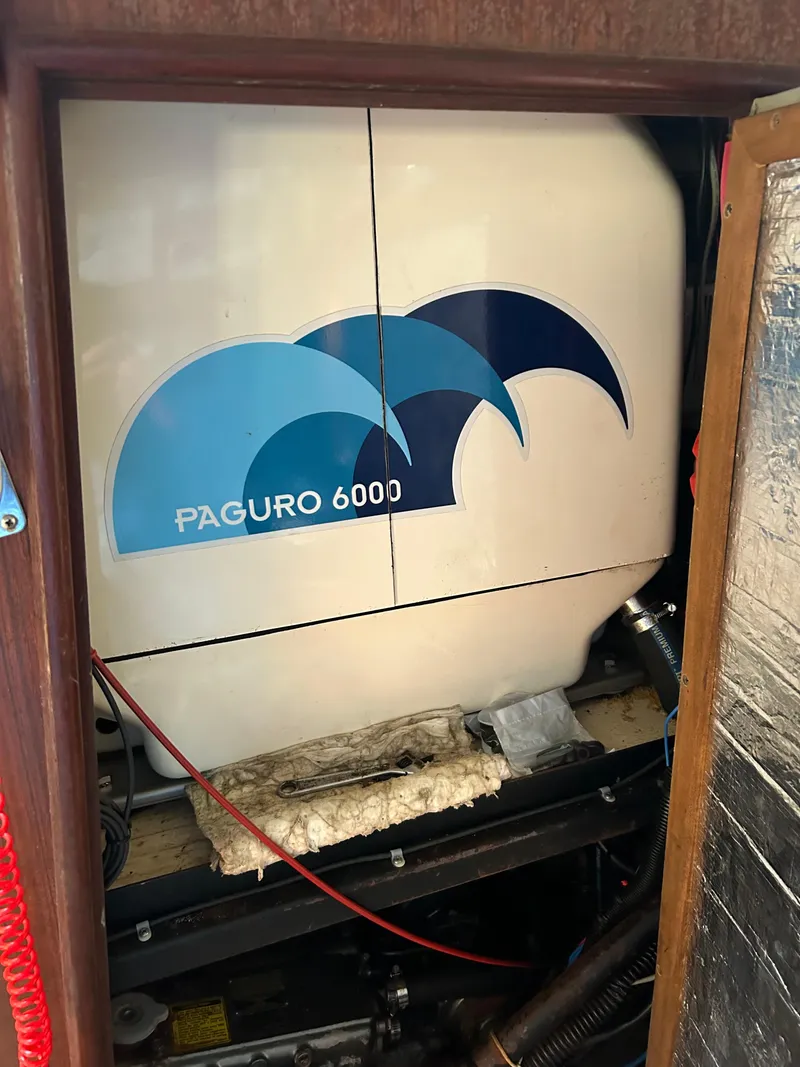 Slide: The Image of Paguro 6000 generator inside 1991 Hunter 42 Passage sailboat engine compartment. - 22