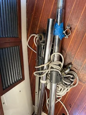 Slide: The Image of Sailing equipment on wooden deck of 1991 Hunter 42 Passage yacht. - 38