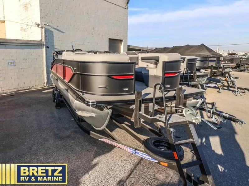 Slide: The Image of 2025 Cabrio Ultra-Lounge 22UC pontoon boat on trailer at Bretz RV & Marine. - 3