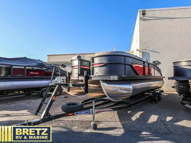 Slide: The Image of 2025 Cabrio Ultra-Lounge 22UC pontoon boat on trailer at Bretz RV & Marine dealership. - 5