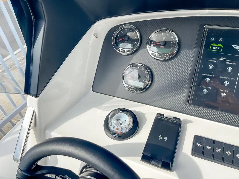 Slide: The Image of Dashboard of 2025 Ribco Venom 30 boat with gauges and digital display. - 17