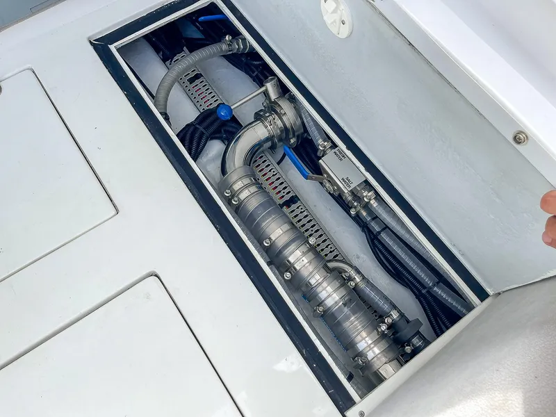 Slide: The Image of Ribco Venom 30 (2025) engine compartment showcasing mechanical components and hoses. - 32