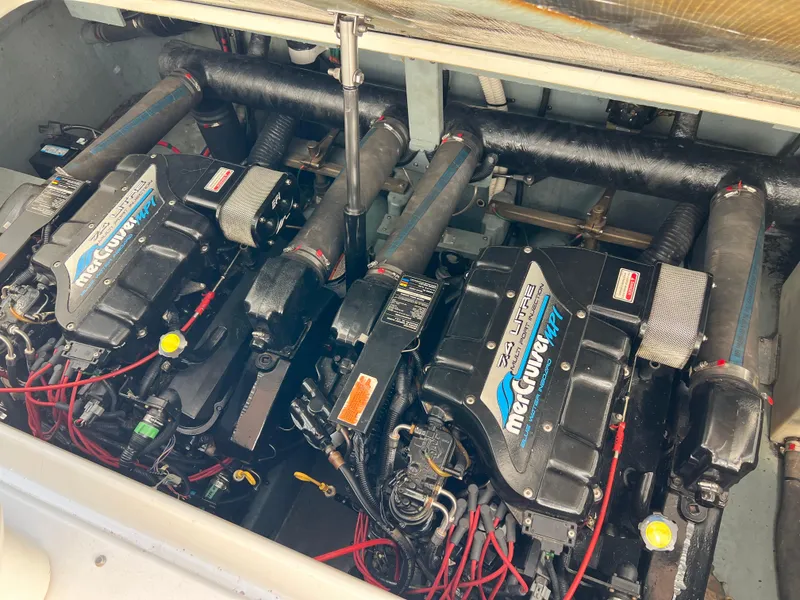 Slide: The Image of Engine compartment of a 1997 Sea Ray 330 Sundancer Cruiser with twin MerCruiser engines. - 22