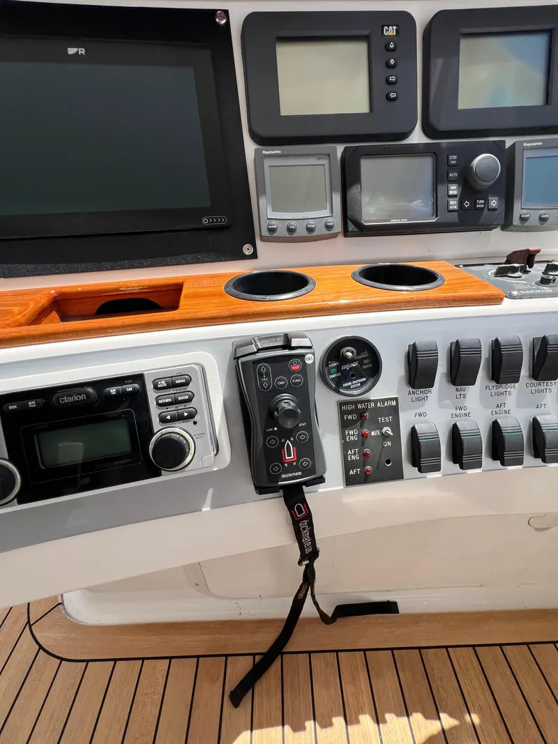 Slide: The Image of Control panel of 2005 Neptunus 62 Flybridge yacht with navigation instruments. - 14