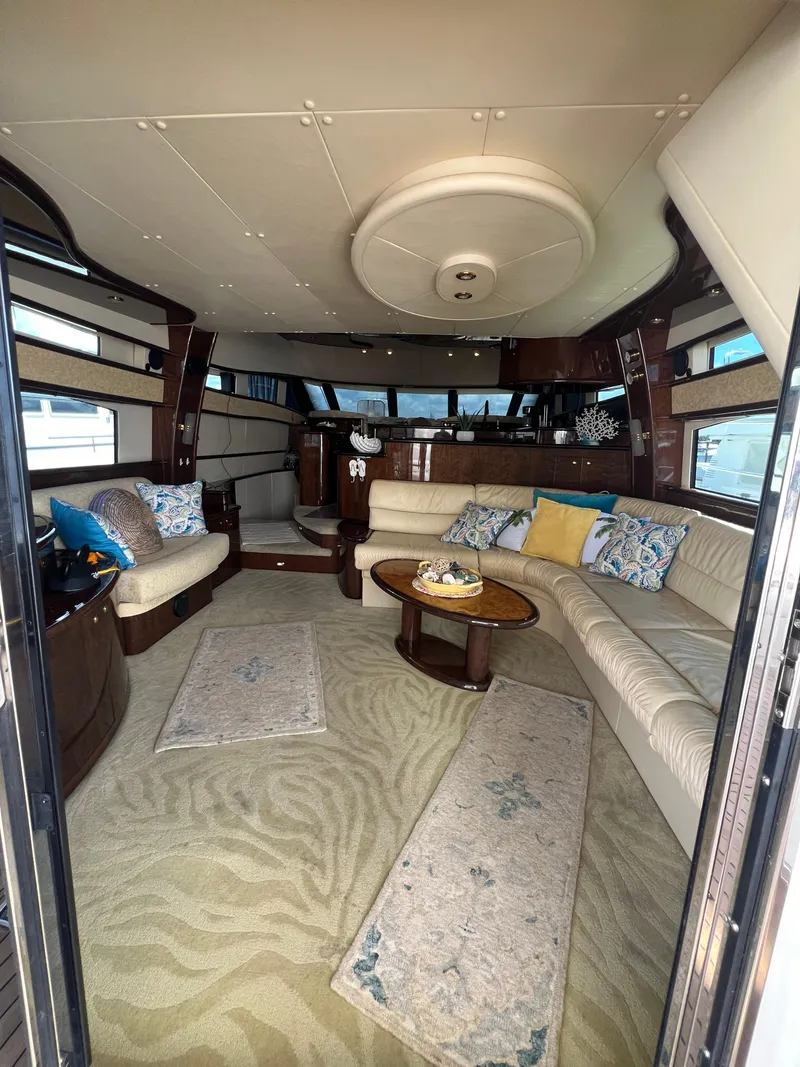 Slide: The Image of Luxurious interior of 2005 Neptunus 62 Flybridge yacht with elegant seating and decor. - 20