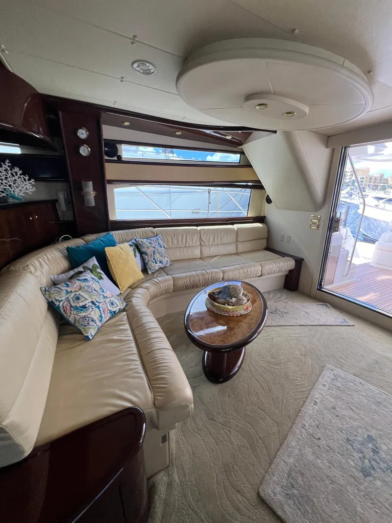 Slide: The Image of Luxurious interior of 2005 Neptunus 62 Flybridge yacht with elegant seating and decor. - 23