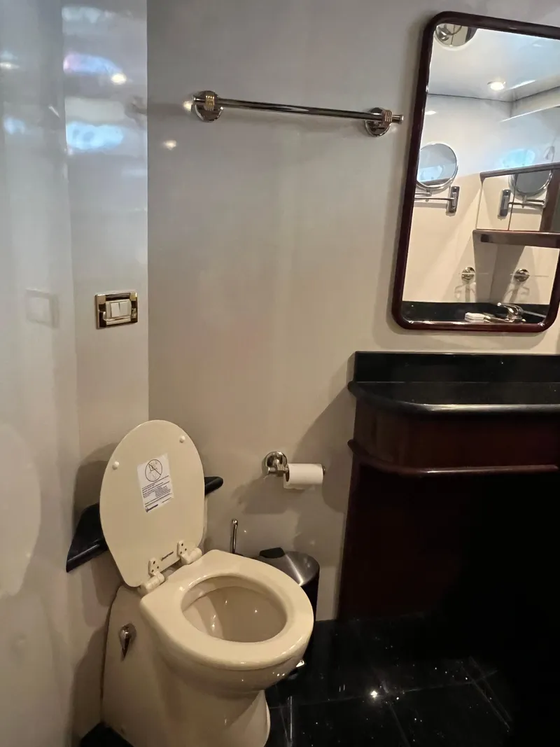 Slide: The Image of Luxurious bathroom in 2005 Neptunus 62 Flybridge yacht with modern amenities. - 39