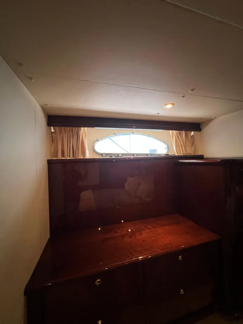 Slide: The Image of Interior cabin of 2005 Neptunus 62 Flybridge yacht with wooden furniture. - 41