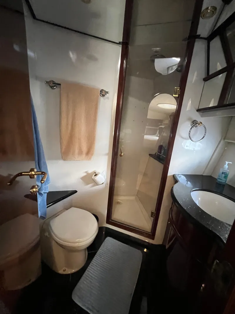 Slide: The Image of Luxurious bathroom in 2005 Neptunus 62 Flybridge yacht with shower and modern amenities. - 47