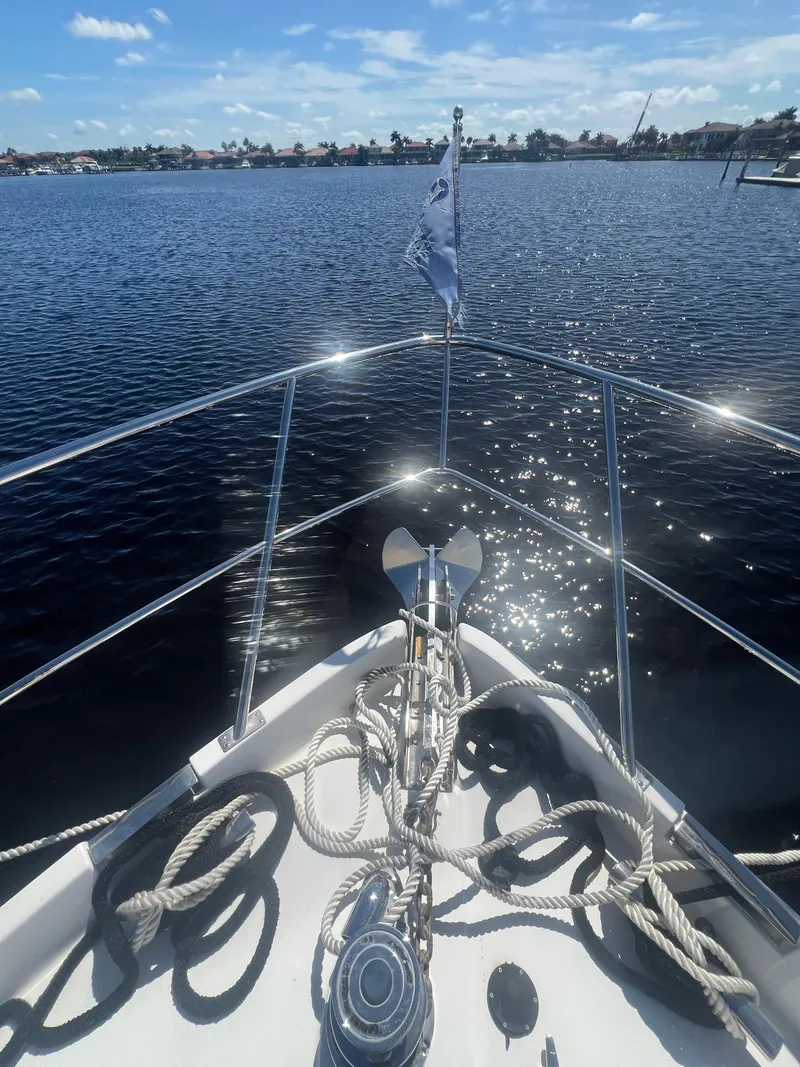 Slide: The Image of Bow view of 2005 Neptunus 62 Flybridge yacht on a sunny day. - 9