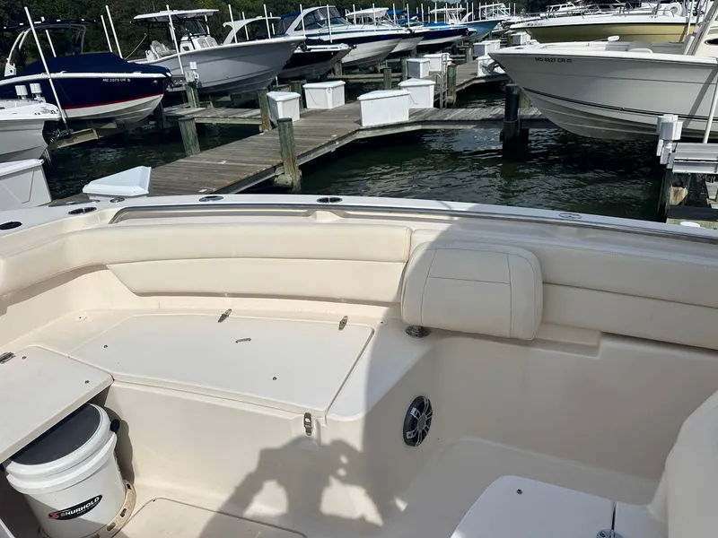 Slide: The Image of 2022 Grady-White Canyon 271 boat interior at marina dock. - 13