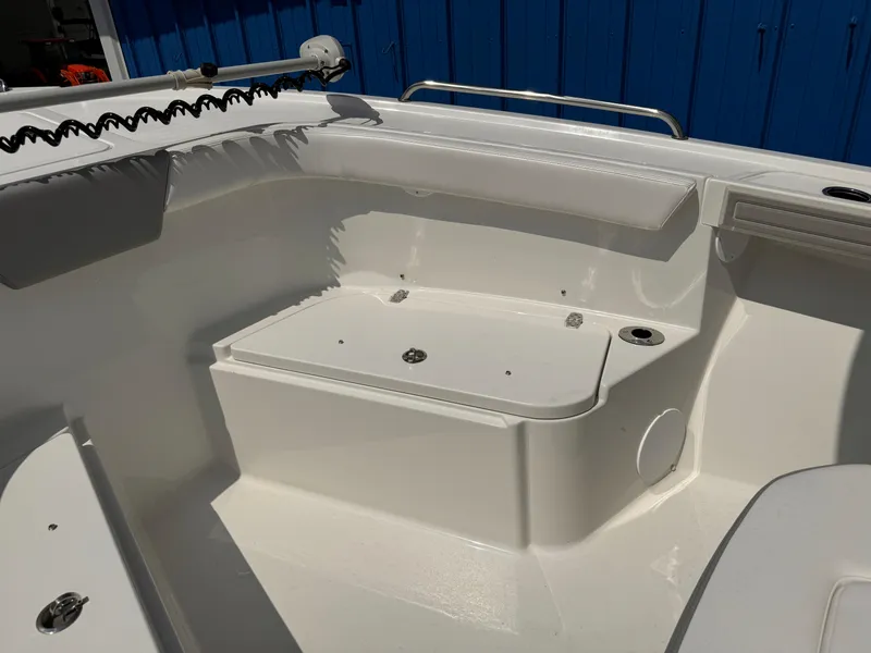 Slide: The Image of 2025 Parker 2200 Center Console boat interior with seating and storage. - 10