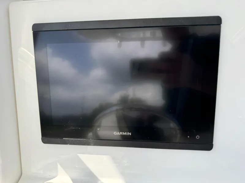 Slide: The Image of Garmin display on 2025 Parker 2200 Center Console boat dashboard. - 14