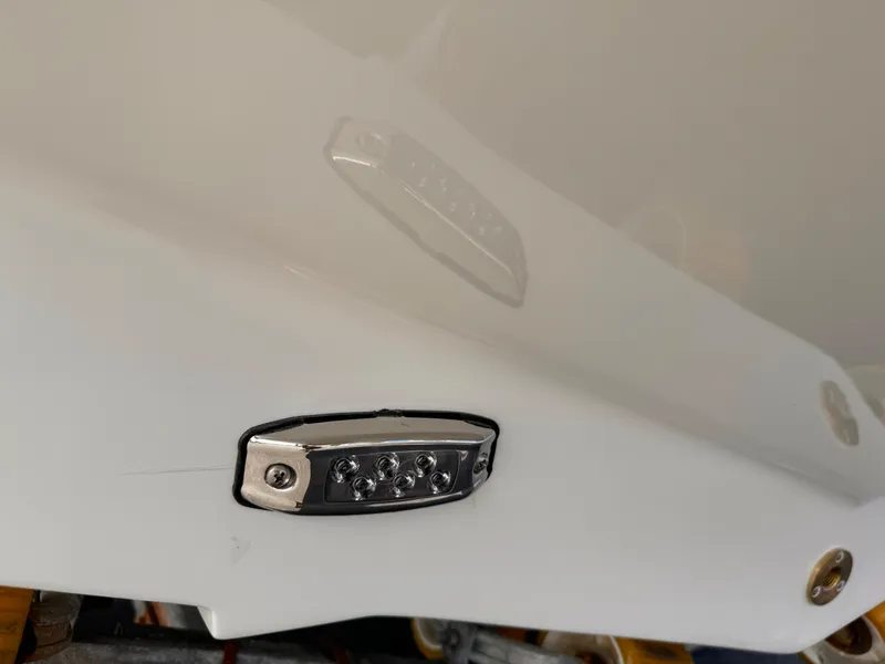 Slide: The Image of 2025 Parker 2200 Center Console boat detail with LED light fixture. - 21