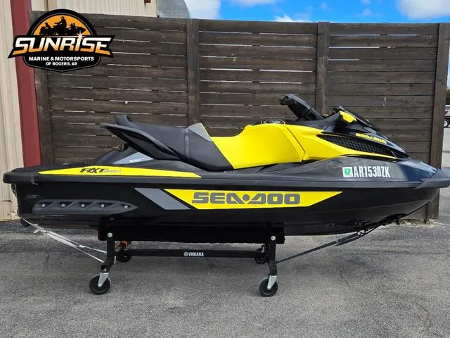 Slide: The Image of 2016 Sea-Doo RXT Waverunner in yellow and black, displayed at Sunrise Marine & Motorsports. - 1