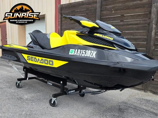 Slide: The Image of 2016 Sea-Doo RXT Waverunner in black and yellow, displayed at Sunrise Marine & Motorsports. - 11