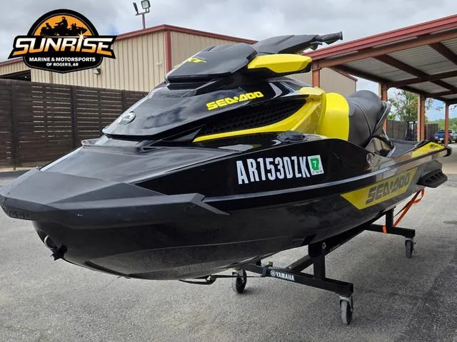 Slide: The Image of 2016 Sea-Doo RXT Waverunner in black and yellow at Sunrise Marine & Motorsports. - 13
