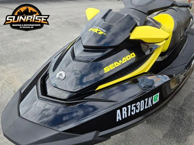 Slide: The Image of 2016 Sea-Doo RXT Waverunner, black and yellow, at Sunrise Marine & Motorsports. - 15