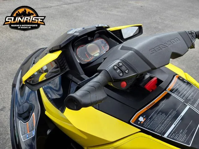 Slide: The Image of 2016 Sea-Doo Waverunner RXT, yellow and black, dashboard view, Sunrise Marine logo. - 16