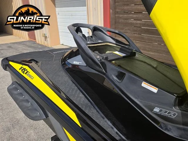 Slide: The Image of 2016 Sea-Doo RXT Waverunner in black and yellow at Sunrise Marine. - 6