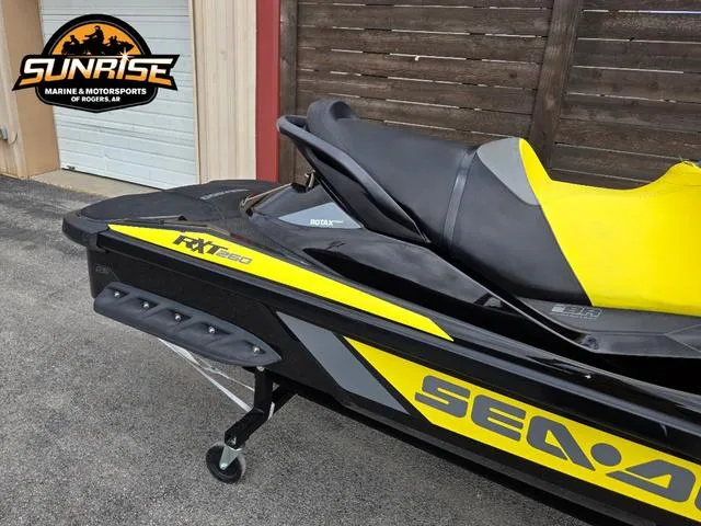 Slide: The Image of 2016 Sea-Doo RXT Waverunner in black and yellow at Sunrise Marine & Motorsports. - 8