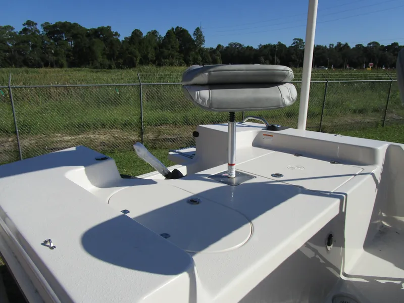 Slide: The Image of 2025 Carolina Skiff JLS Series 178JLS boat deck with seating, outdoors. - 2