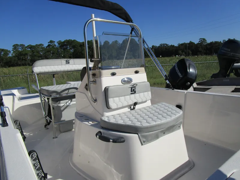 Slide: The Image of 2025 Carolina Skiff JLS Series 178JLS boat interior with seating and console. - 4