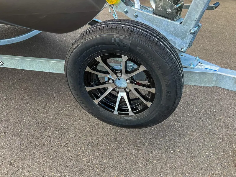Slide: The Image of 2025 Stabicraft 1850 Fisher trailer wheel with black alloy rim. - 22
