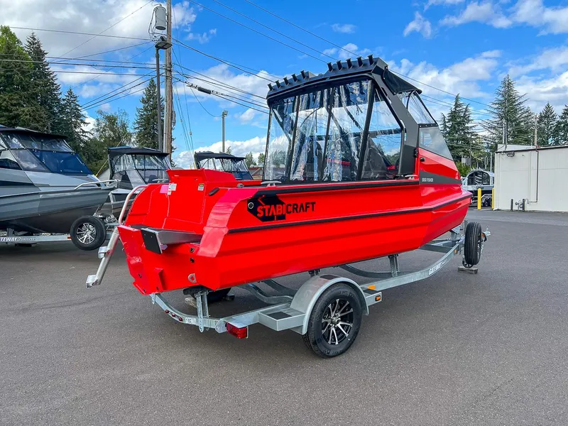 Slide: The Image of 2025 Stabicraft 1850 Fisher boat in vibrant red on a trailer. - 3