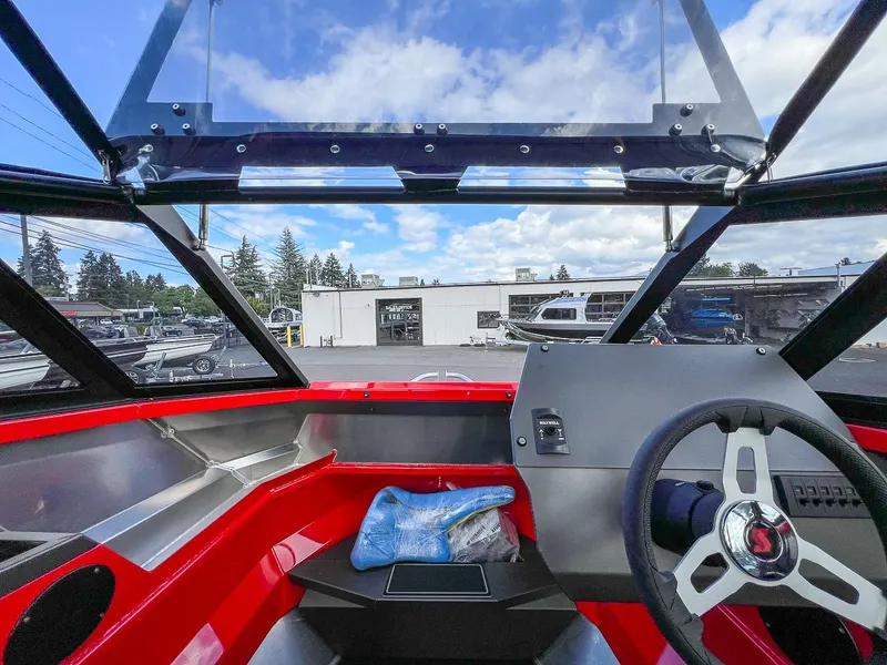 Slide: The Image of Interior view of 2025 Stabicraft 1850 Fisher boat with steering wheel and dashboard. - 8