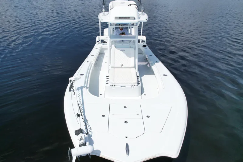 Slide: The Image of 2020 Costa Custom Boats 264 HC on calm water, aerial view. - 5