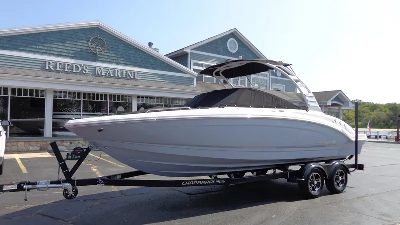 Slide: The Image of 2025 Chaparral 23 SSi boat on trailer at Reed's Marine dealership. - 38