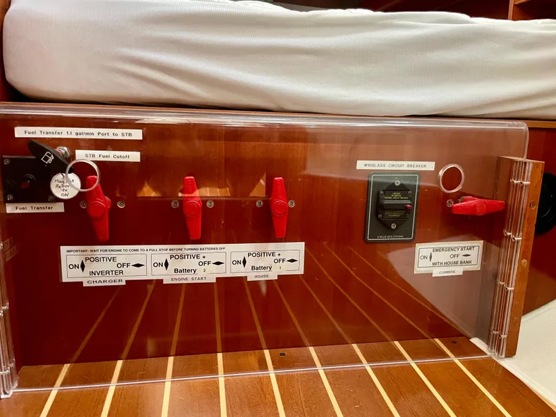 Slide: The Image of Electrical control panel on a 2007 Beneteau 423 yacht with labeled switches and controls. - 26