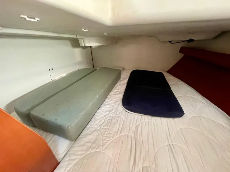Slide: The Image of Interior cabin of 2007 Beneteau 423 sailboat with bed and cushions. - 27