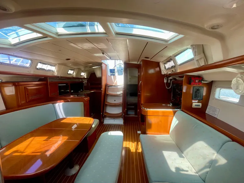 Slide: The Image of Interior of 2007 Beneteau 423 sailboat with wood finish and skylights. - 34