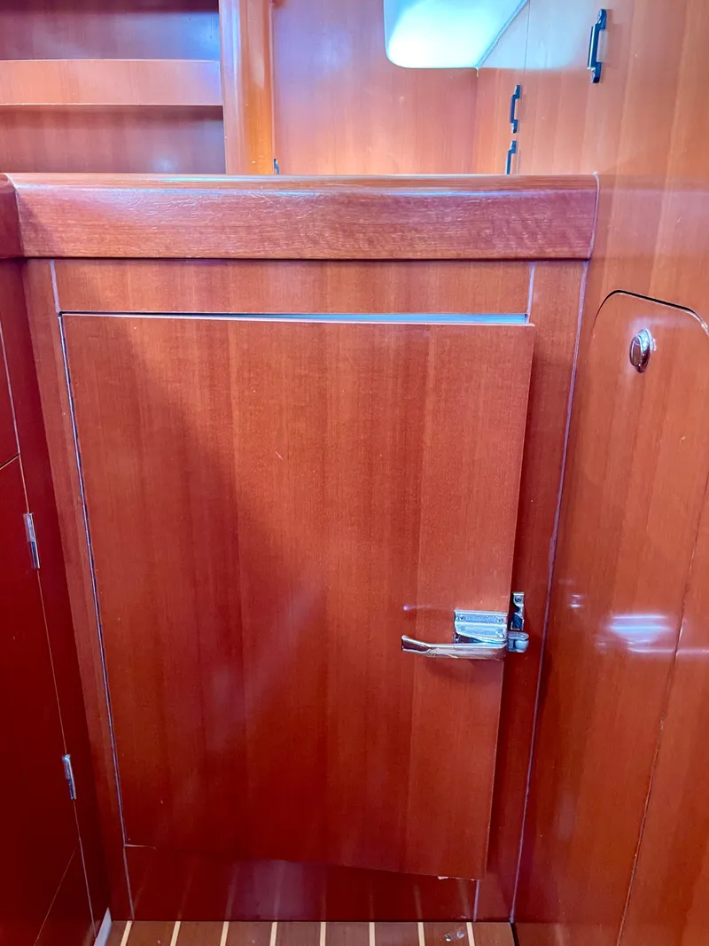 Slide: The Image of Wooden interior door on a 2007 Beneteau 423 sailboat. - 46