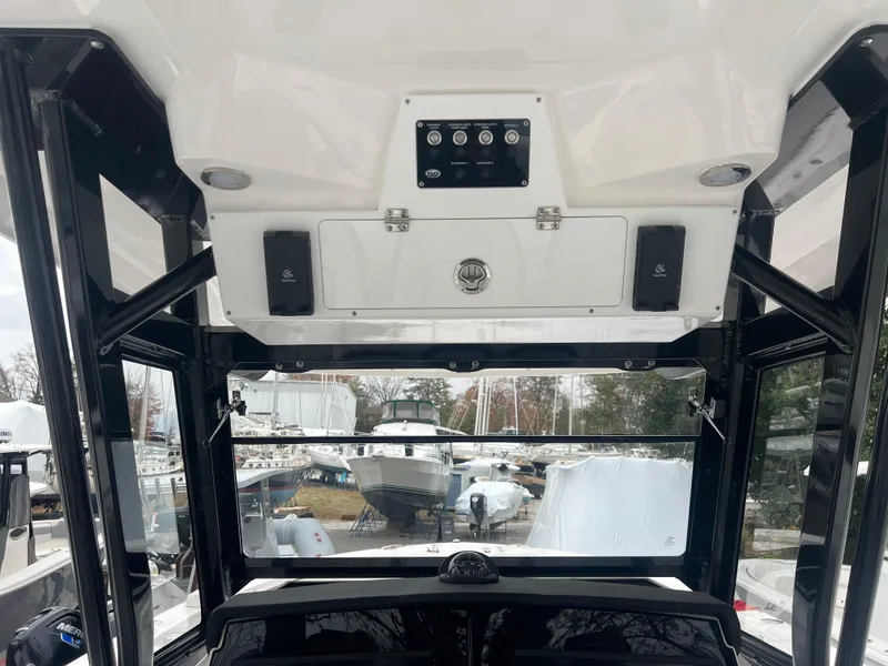 Slide: The Image of Interior view of 2025 Sea Fox 328 Commander boat cockpit with control panel. - 7