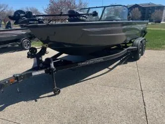 Slide: The Image of 2024 Ranger VS1882SC Angler boat on trailer, parked outdoors on a sunny day. - 0