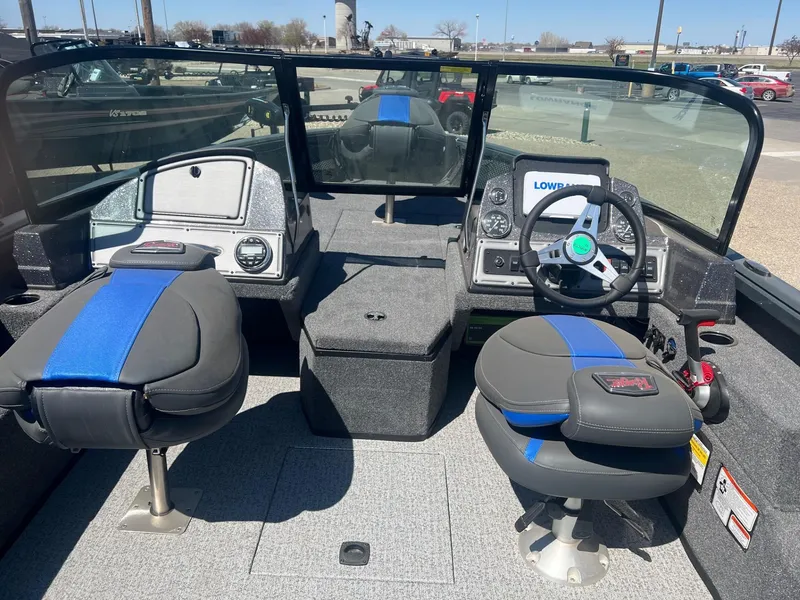 Slide: The Image of 2024 Ranger VS1882SC Angler boat interior with dual seats and steering console. - 5