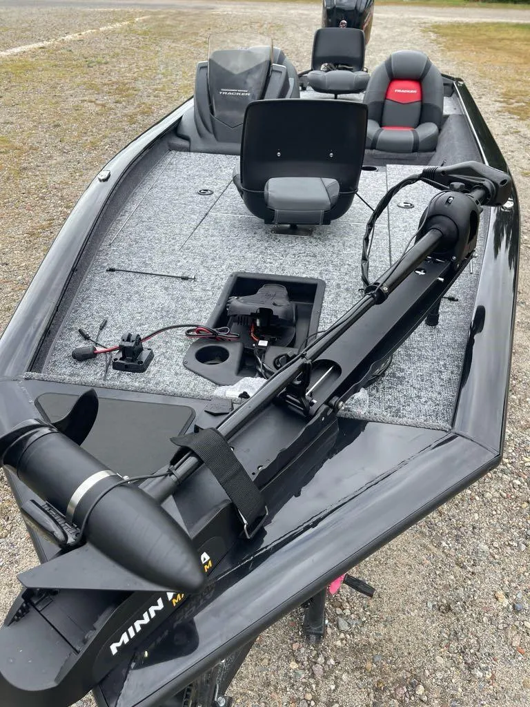 Slide: The Image of 2025 Tracker Pro Team 190 fishing boat with Minn Kota trolling motor. - 2