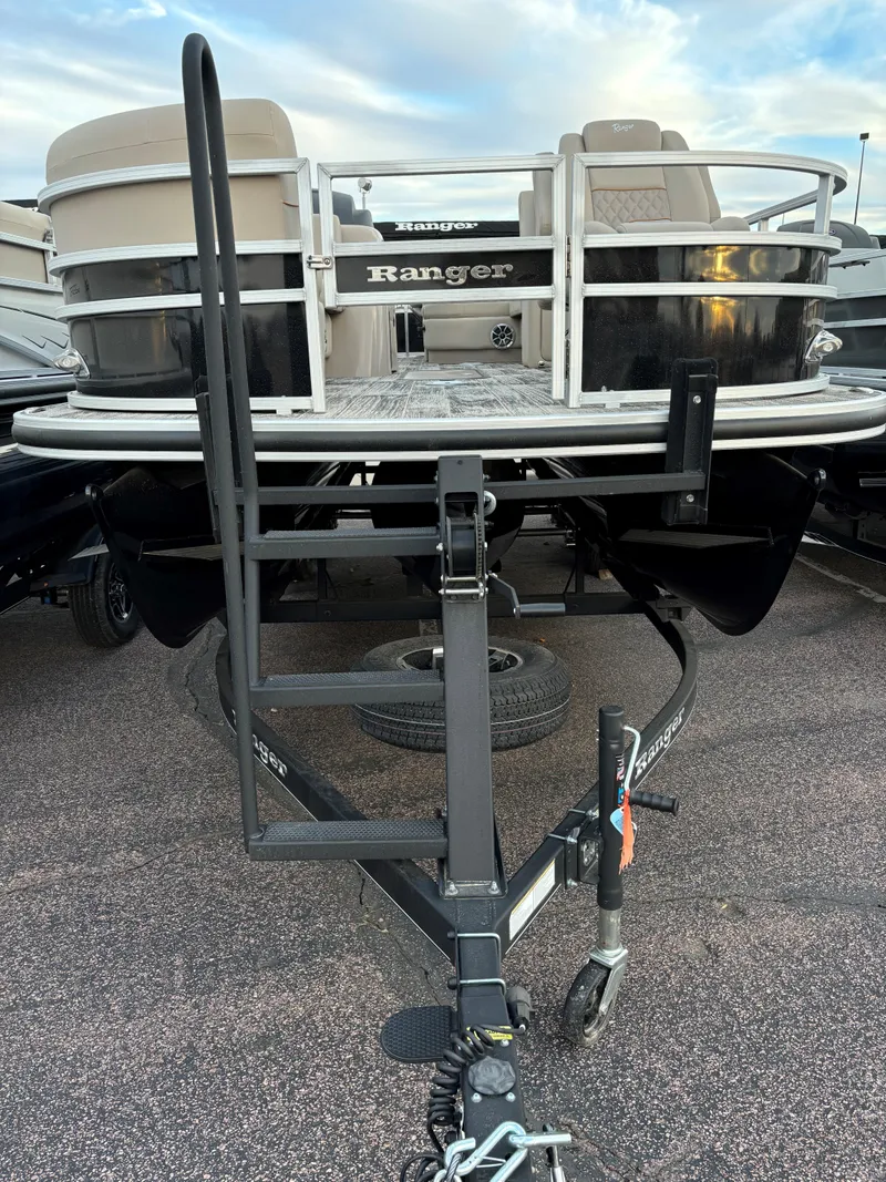 Slide: The Image of 2024 Ranger Reata 223FC boat on trailer, front view. - 3
