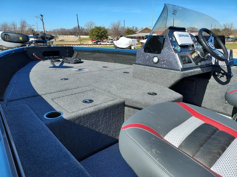Slide: The Image of 2024 Ranger VS1782SC Angler boat interior with seating and control panel. - 2