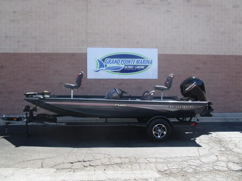 Slide: The Image of 2024 Ranger RT188C fishing boat at Grand Pointe Marina, side view. - 2