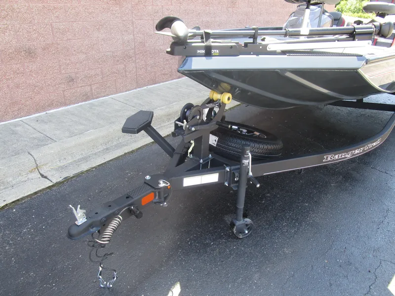 Slide: The Image of 2024 Ranger RT188C boat trailer hitch and front view on pavement. - 33