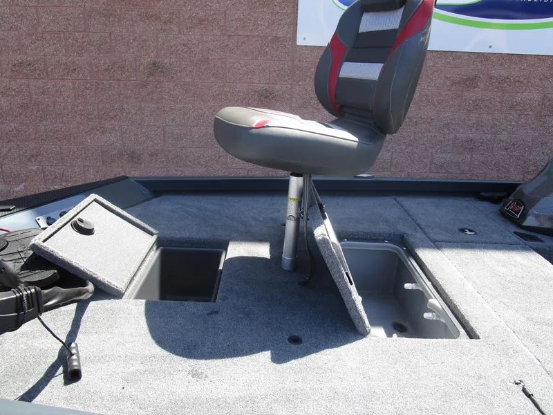 Slide: The Image of 2024 Ranger RT188C boat interior with storage compartments and seating. - 36