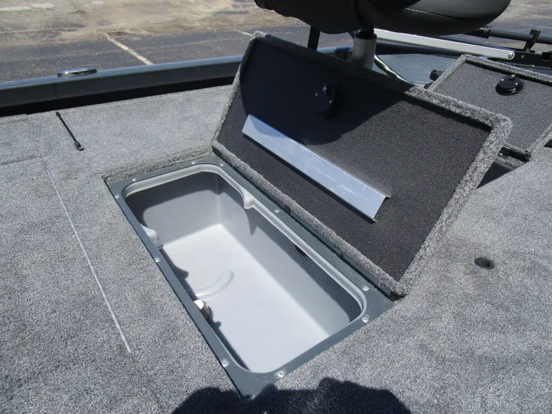 Slide: The Image of 2024 Ranger RT188C boat storage compartment with open lid, showcasing interior space. - 38