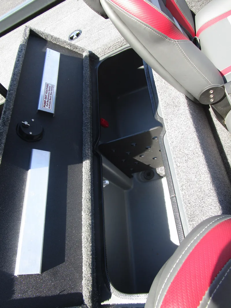 Slide: The Image of 2024 Ranger RT188C boat storage compartment with open lid and seating. - 41