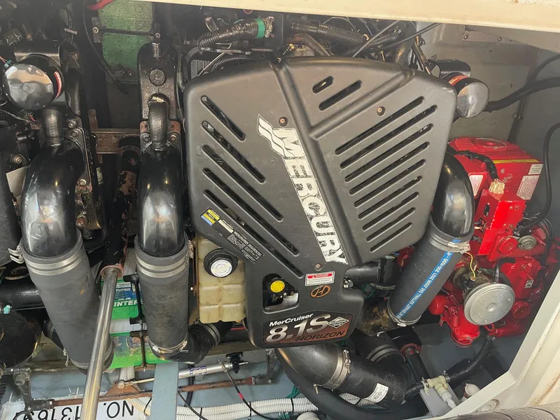 Slide: The Image of Engine compartment of 2002 Sea Ray 340 Sundancer with Mercury 8.1S motor. - 33