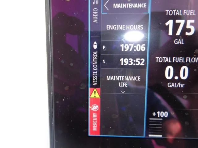 Slide: The Image of Display screen of a 2022 Contender 32 ST showing engine hours and fuel data. - 9